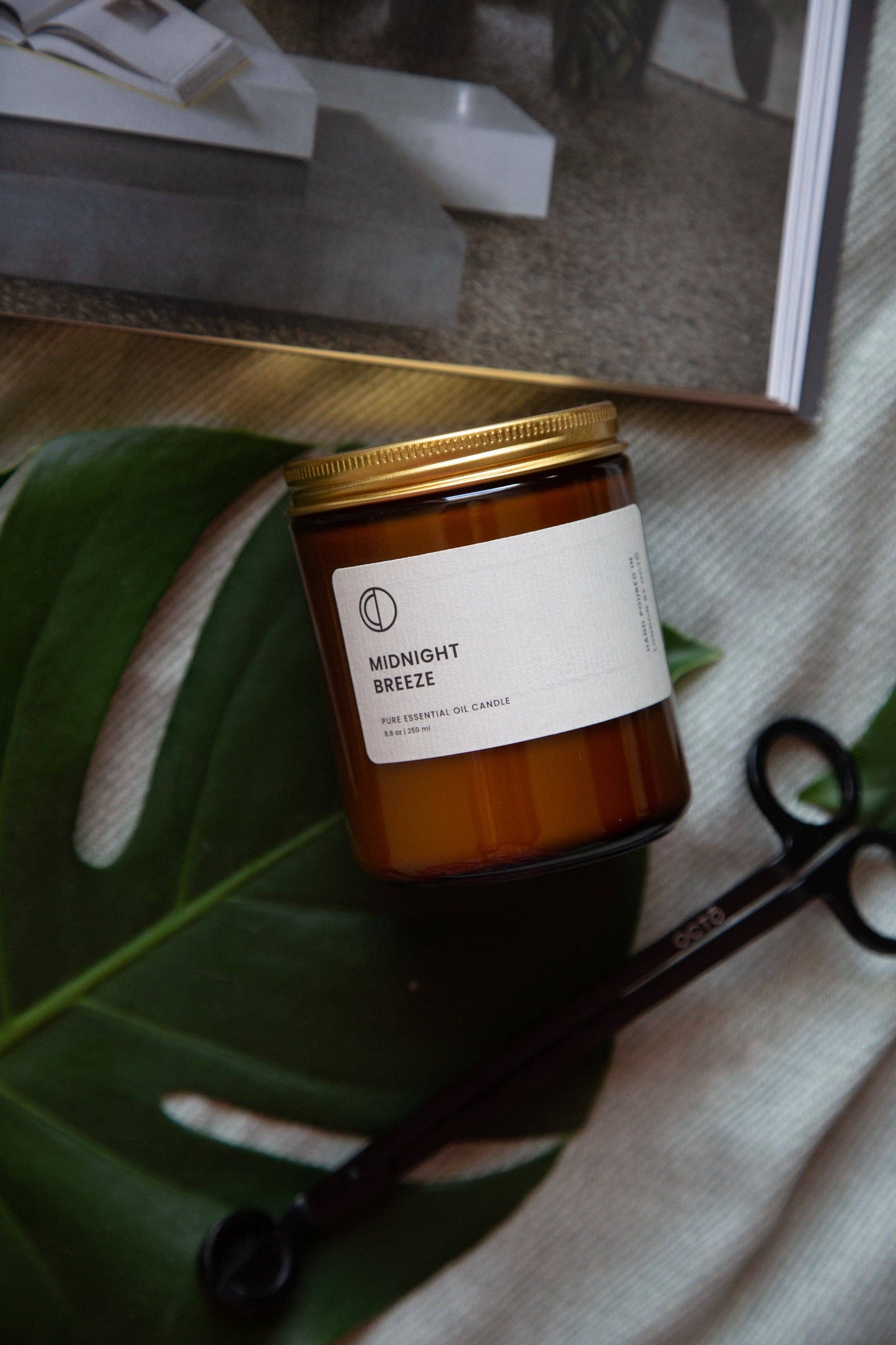 OCTŌ Midnight Breeze candle (Rose Geranium + Vetiver + Patchouli)