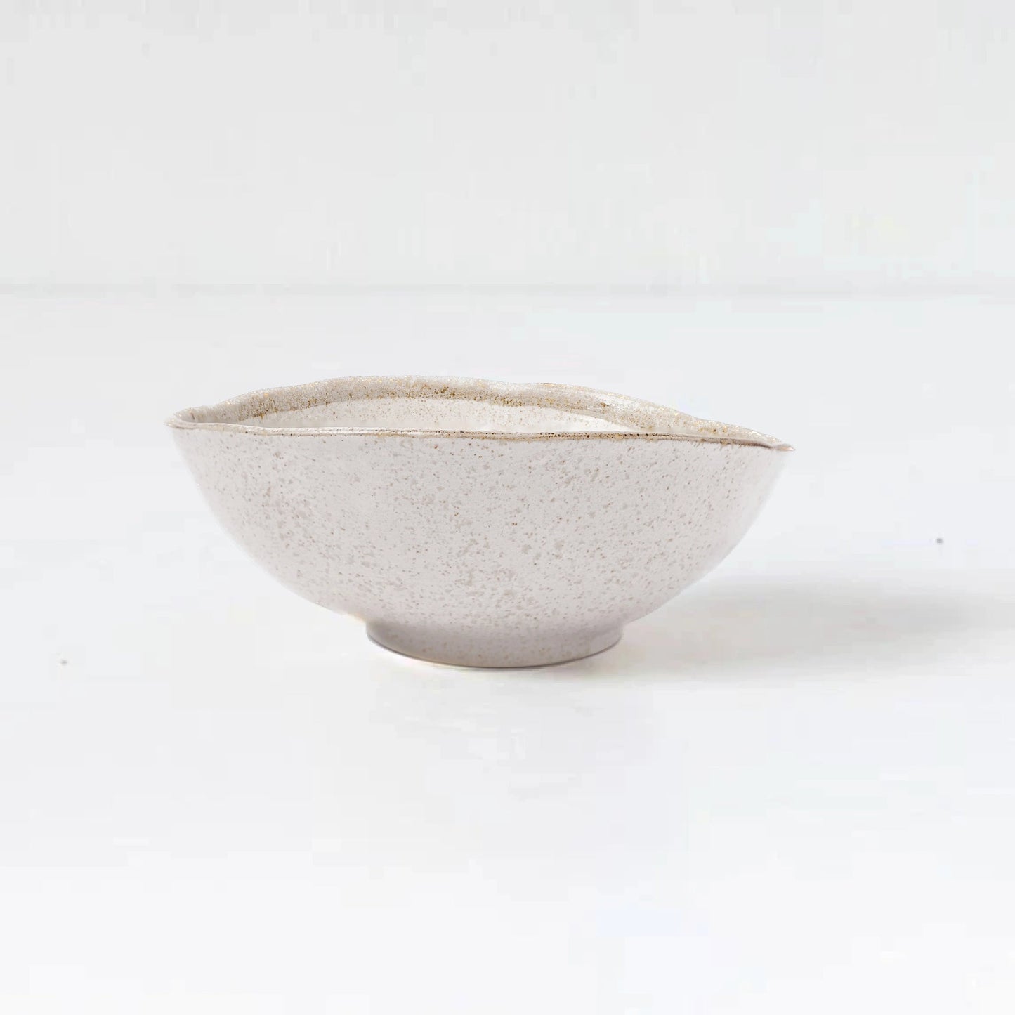 White ceramic bowl on a white background