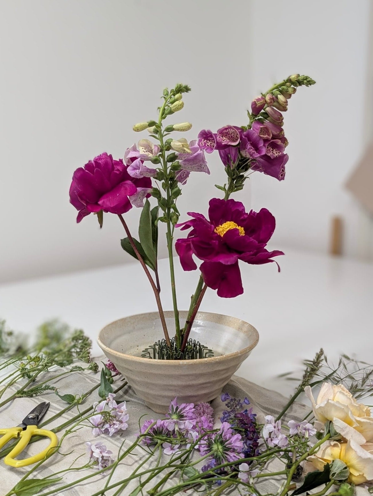 Floral Genius Hair Pin Flower Frog holder presented in a bowl at The Country Crib