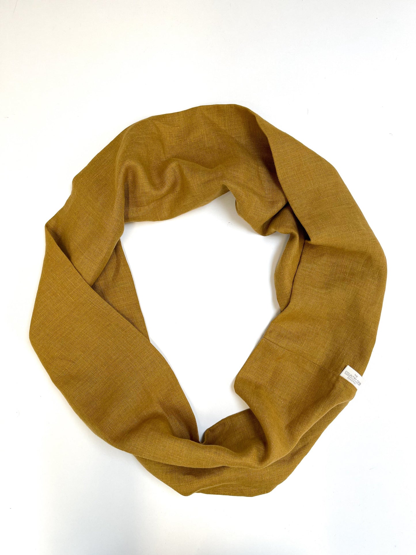 A unisex scarf for all seasons. Long enough to wrap around twice. Handcrafted in our studio using premium linen.