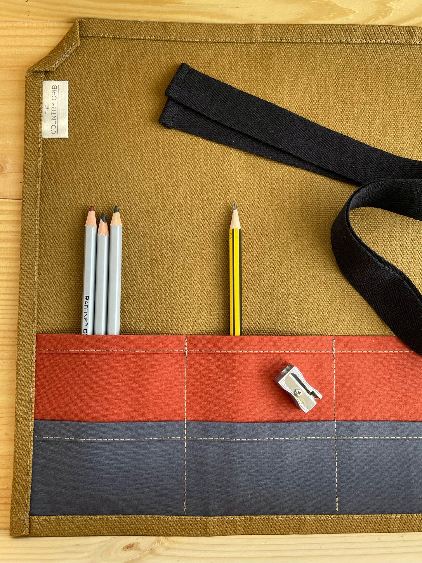 An extremely useful and versatile artist roll, made with organic dry waxed cotton canvas. Designed and handcrafted by us at The Country Crib. Keep all your pens, brushes and equipment together in this essential addition to your art and crafts kit.
