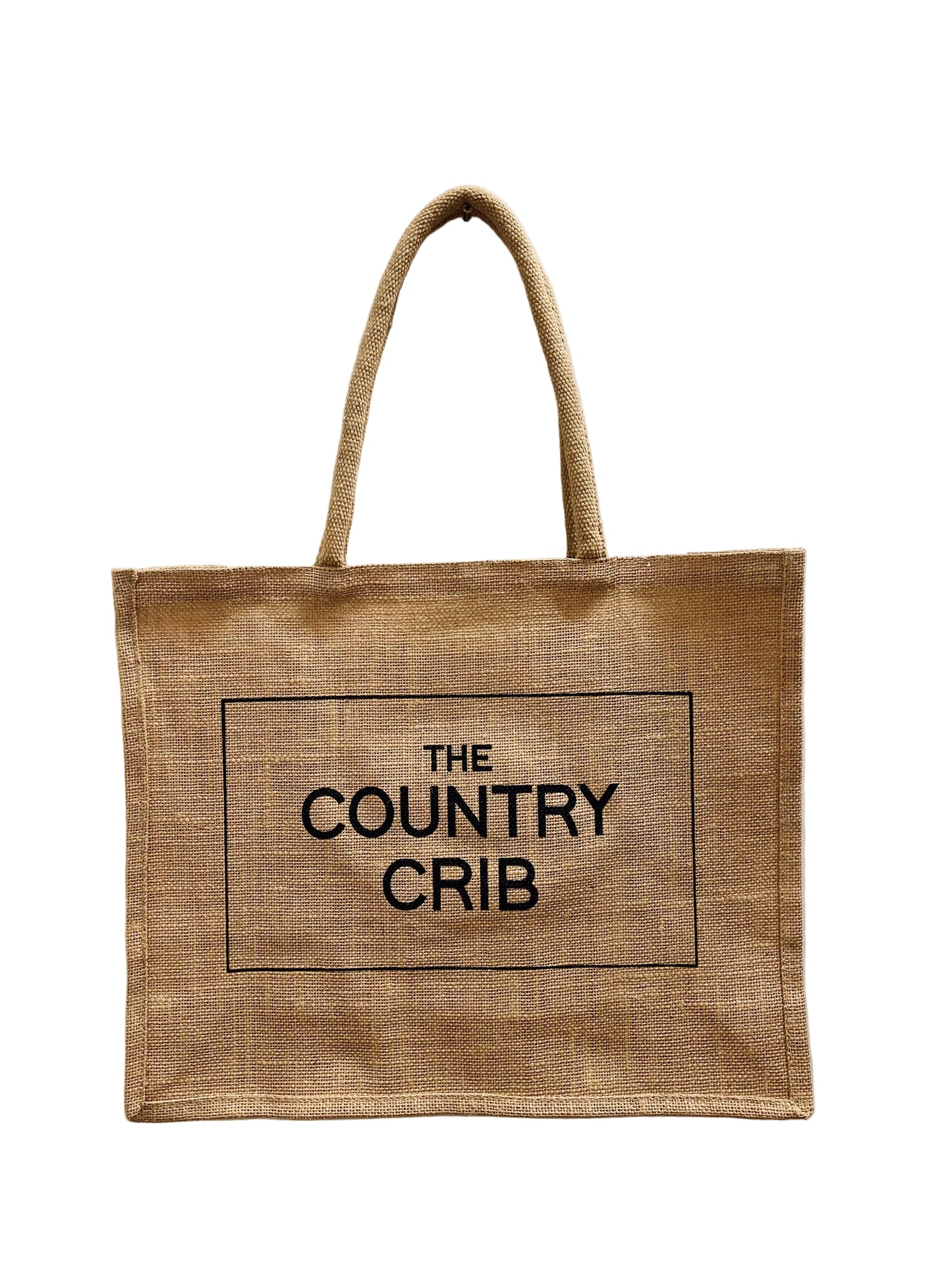 Natural jute tote bag with 'The Country Crib' text on a light gray background