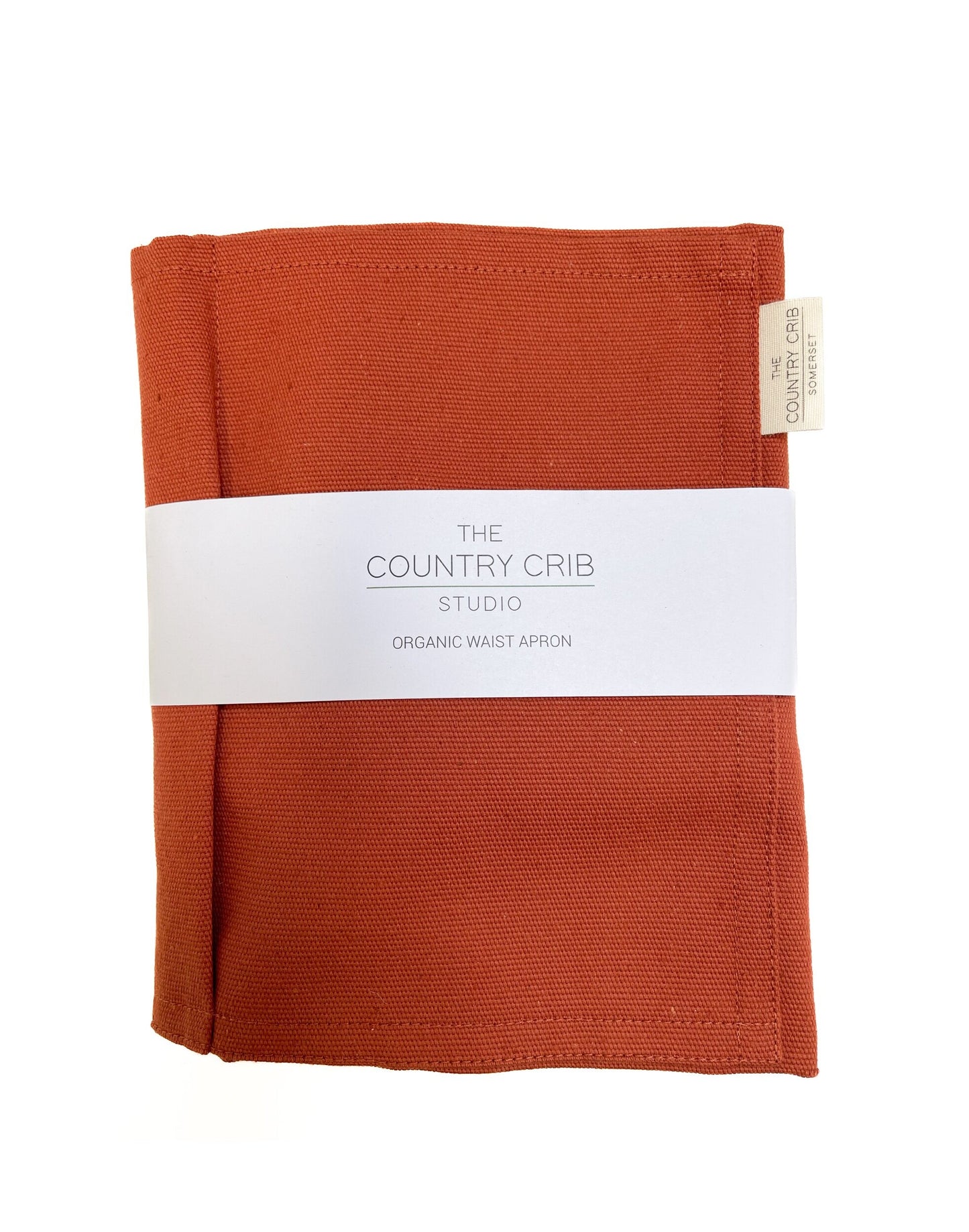 Orange waist apron with a white label on a white background