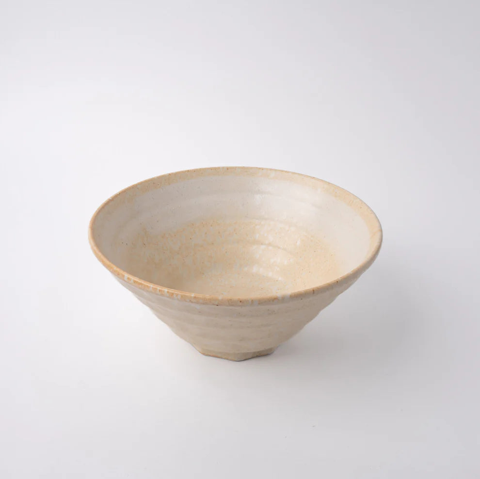 Lovely fluted bowl, with neutral oatmeal creamy tones with a lighter hand painted swirl near the outer edge. Ridged texture on the outside and inside of the bowl.