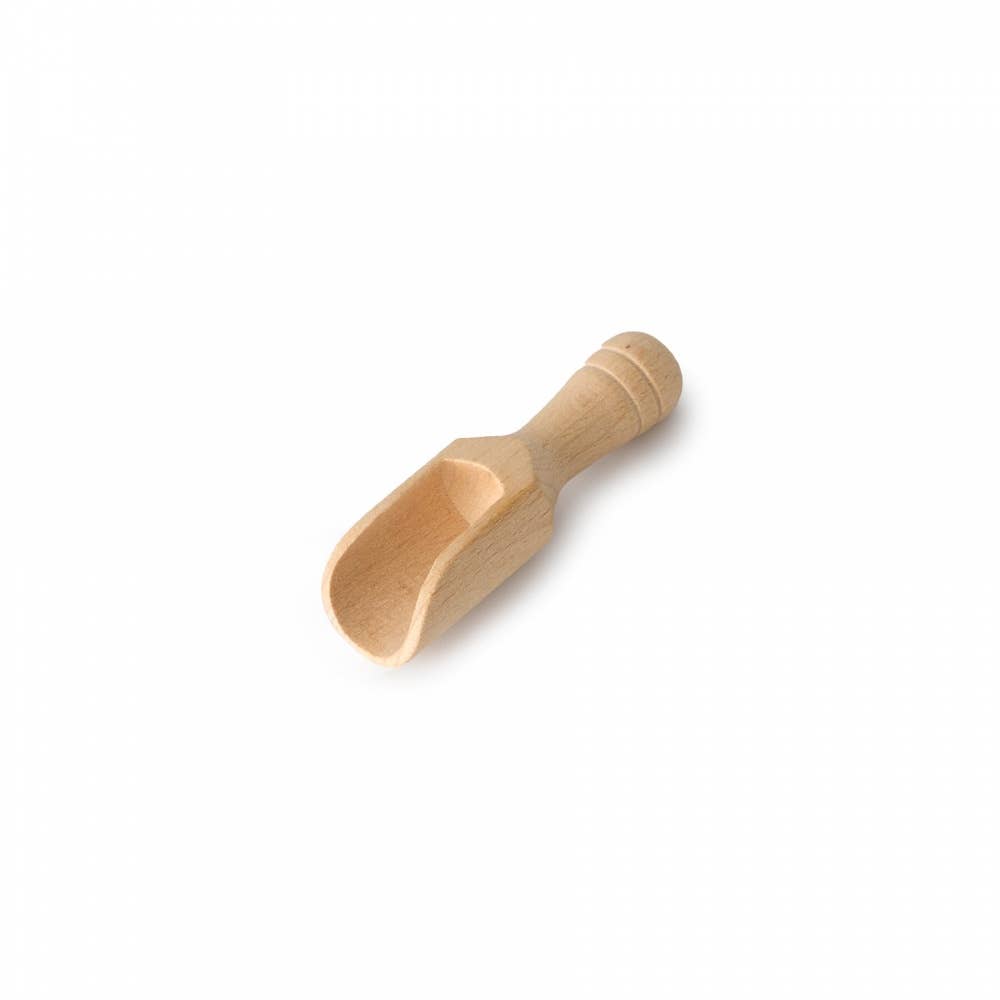 Wooden scoop on a white background