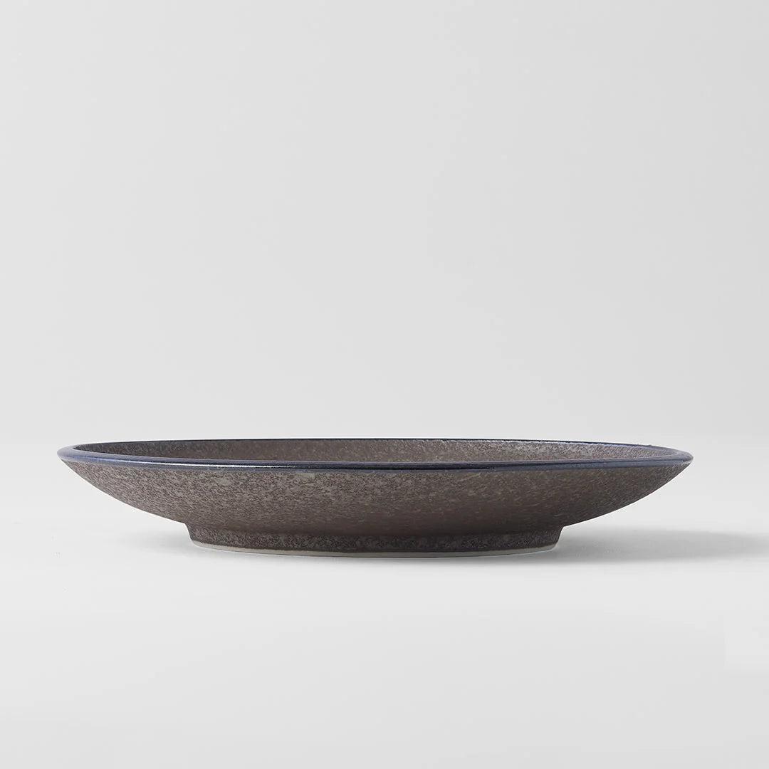 Earth Side Plate, The Earth range features a unique glaze with rustic tones with a focus on simple texture. When turned toward to the light, it shimmers silver