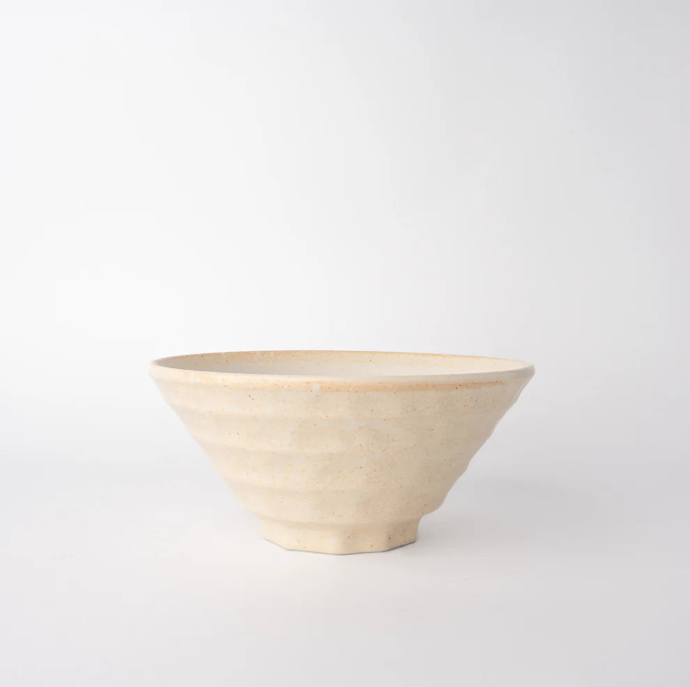 Lovely fluted bowl, with neutral oatmeal creamy tones with a lighter hand painted swirl near the outer edge. Ridged texture on the outside and inside of the bowl.