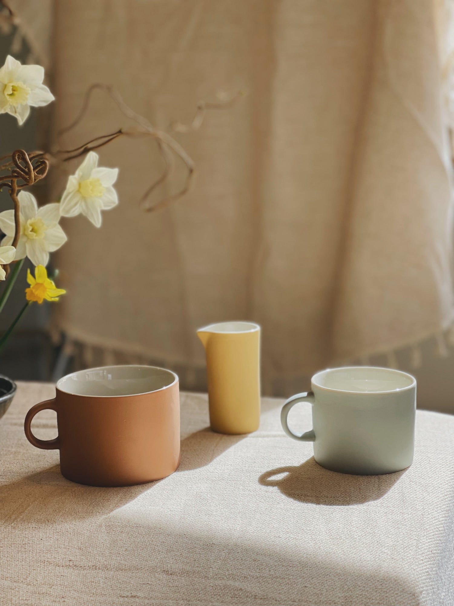 Studio Junc cups and milk jugs made in Lewes, England