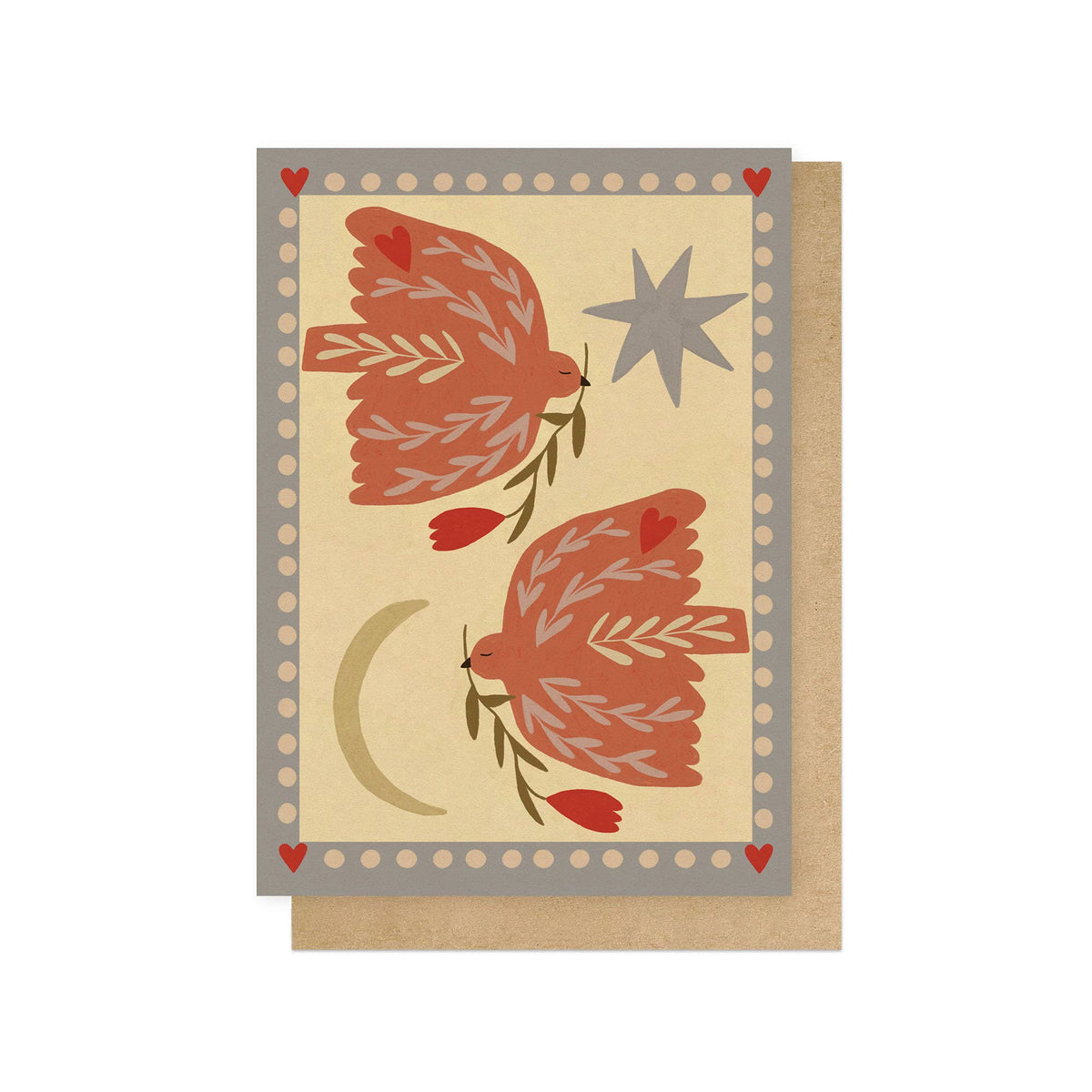 A square greeting card with a folk-art style illustration of two reddish-brown birds carrying green branches, a gray star, a pale yellow crescent moon, and small red hearts, shown with a kraft envelope behind it on a white background.