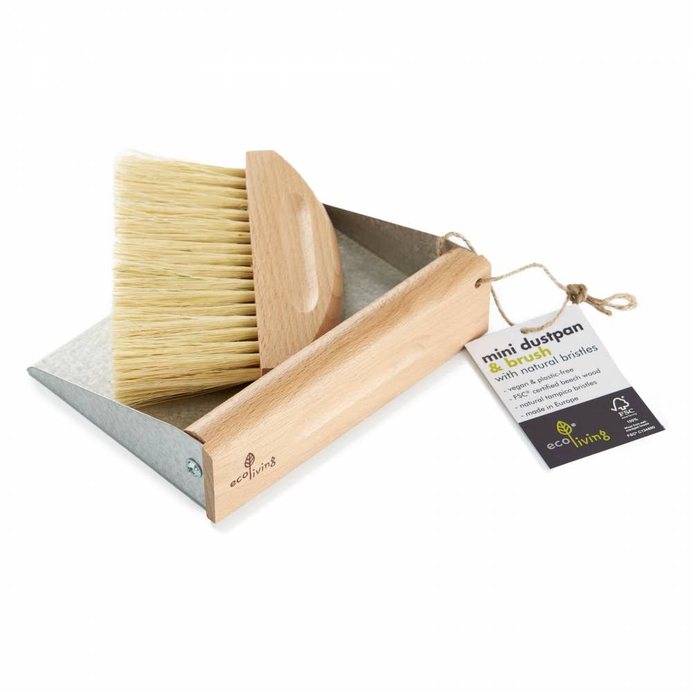 Wooden dustpan and brush set with natural bristles on a white background