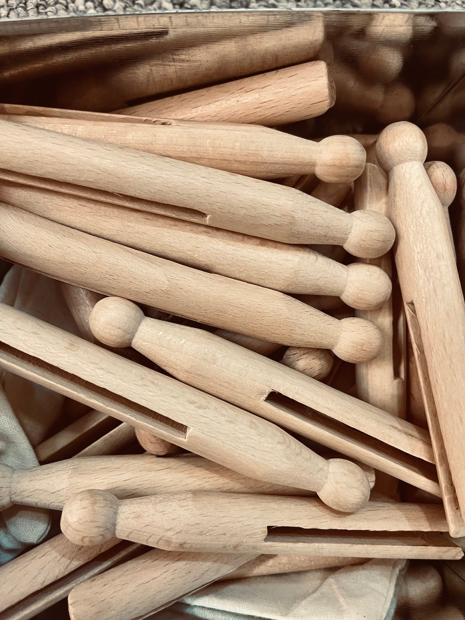 Traditional style wooden pegs. Available as a set of 25 in a cloth drawer-string bag, or singularly
