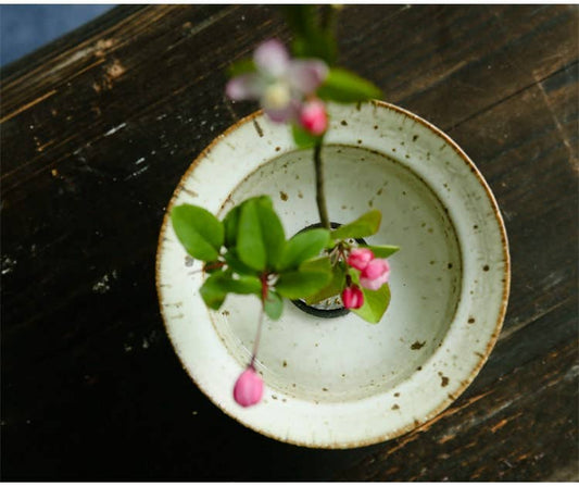 The Gohobi Classic Black &amp; White Ikebana Vase offers a luxurious way to bring the world of Japanese flower arrangement and zen to your home decor. The price listed is for one vase only. Browse our flower frogs here. The small kenzan flower frog is the perfect size for this ikebana vase.