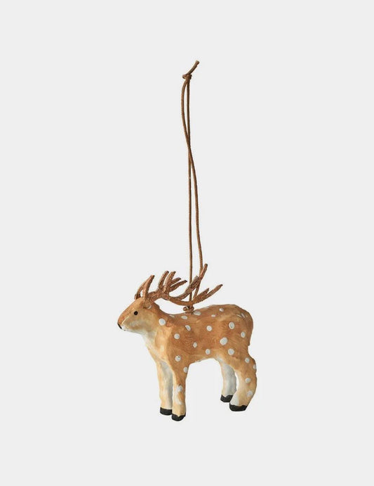 Decorative deer ornament with antlers on a white background