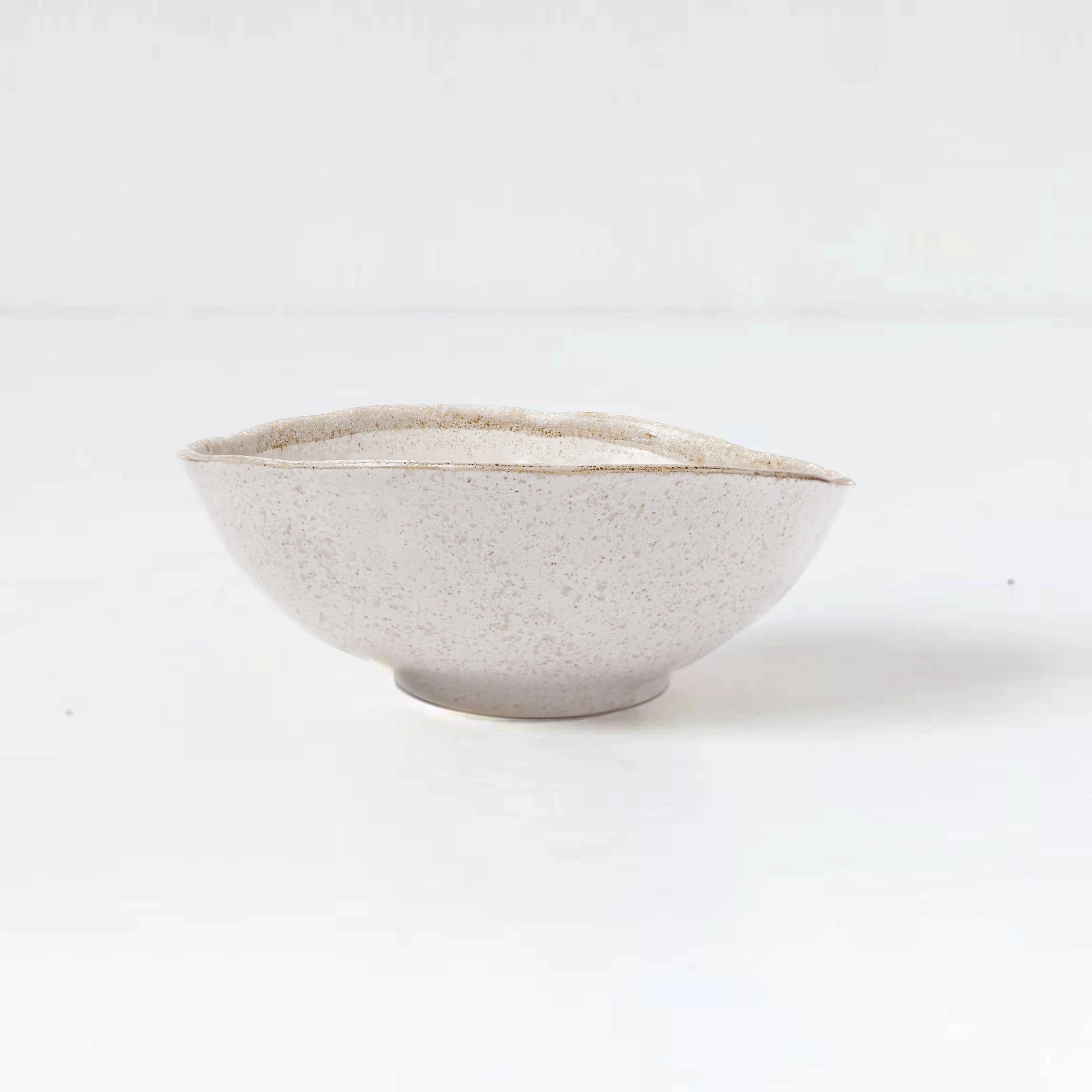 White ceramic bowl on a white background