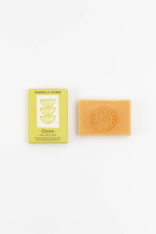 Bar of soap with a yellow label on a white background