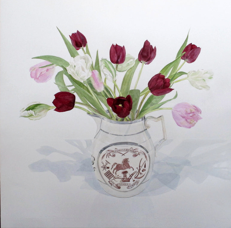 Decorative pitcher with flowers on a white background