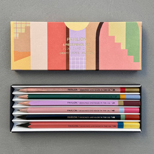 This wonderful 6-piece pencil collection includes 2 square 2H pencils, 2 triangular HB pencils, and 2 hexagonal 2B pencils. Crafted in the UK from sustainably sourced, PEFC-certified wood, each set is presented in a stylish box featuring gold foil accents and a divided tray. Dimensions: 18.5cm x 7cm x 2cm. A perfect gift.