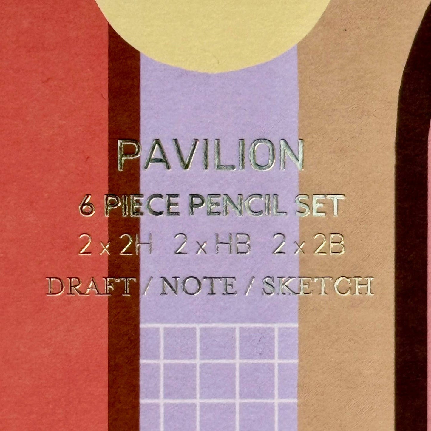 This wonderful 6-piece pencil collection includes 2 square 2H pencils, 2 triangular HB pencils, and 2 hexagonal 2B pencils. Crafted in the UK from sustainably sourced, PEFC-certified wood, each set is presented in a stylish box featuring gold foil accents and a divided tray. Dimensions: 18.5cm x 7cm x 2cm. A perfect gift.