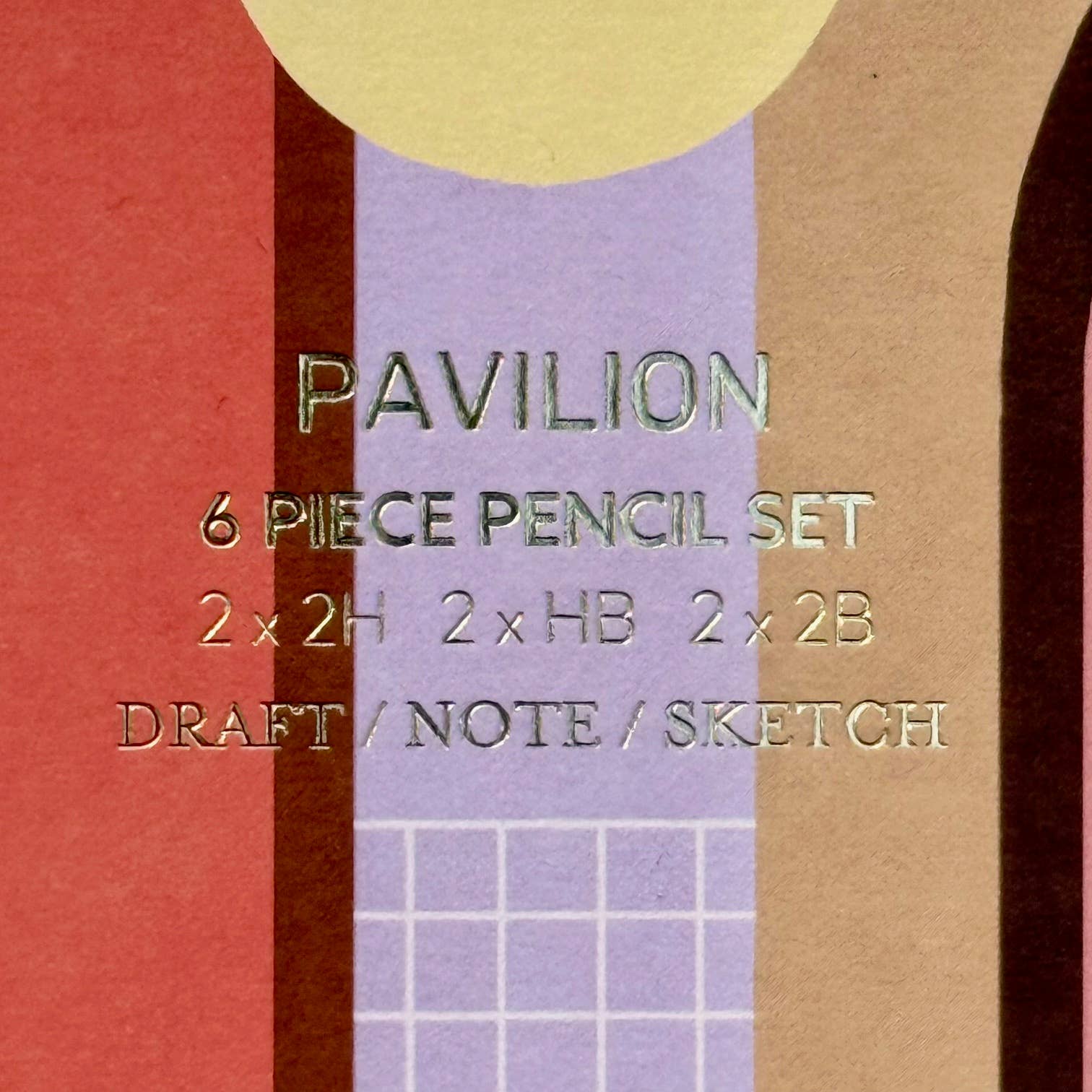This wonderful 6-piece pencil collection includes 2 square 2H pencils, 2 triangular HB pencils, and 2 hexagonal 2B pencils. Crafted in the UK from sustainably sourced, PEFC-certified wood, each set is presented in a stylish box featuring gold foil accents and a divided tray. Dimensions: 18.5cm x 7cm x 2cm. A perfect gift.