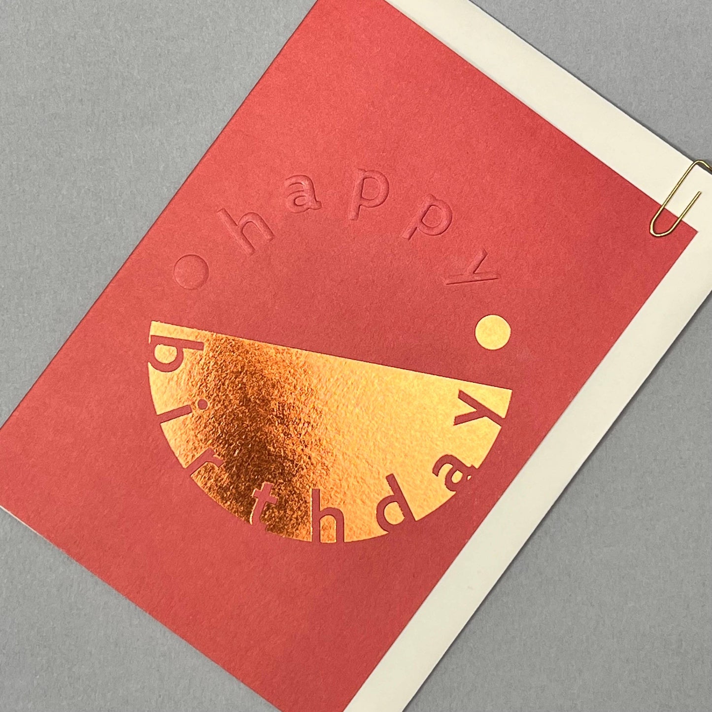 Celebrate a special birthday with this Moon Foiled Embossed Greeting Card, printed on sturdy 350gsm board. The inside is left blank for your personal message. It comes with an ivory envelope and is protected in a biodegradable, compostable cellophane sleeve. Crafted with care in the U.K., this card measures 10.5cm by 15cm, making it a thoughtful and eco-friendly choice.