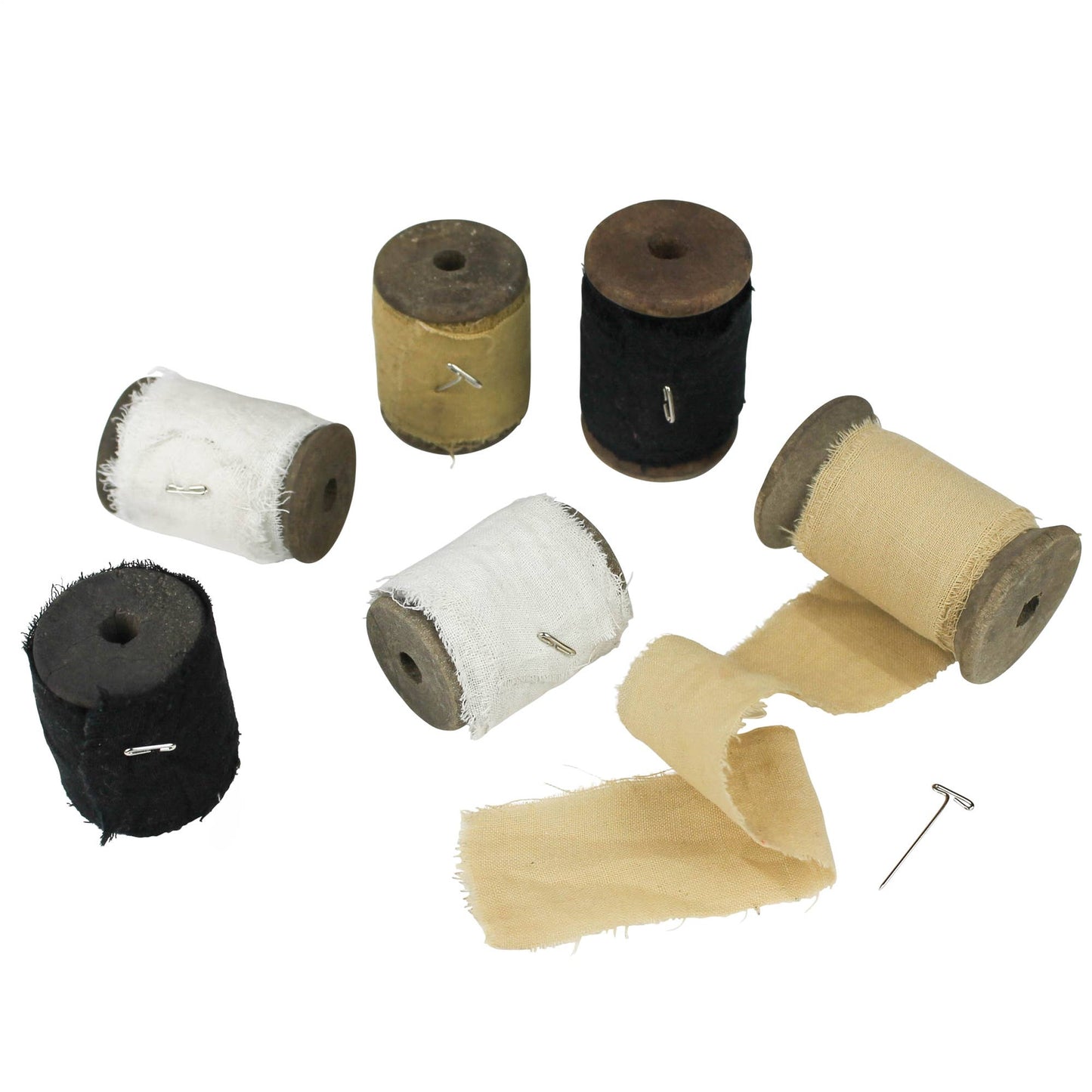 Collection of sari ribbon spools in various neutral colorus on a white background