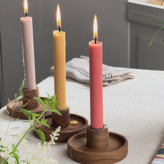 luna candle holder with three lit candles
