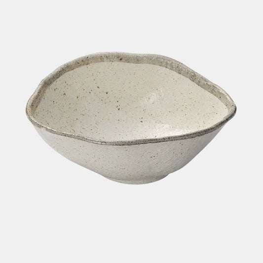 Ceramic bowl with speckled texture on a light gray background